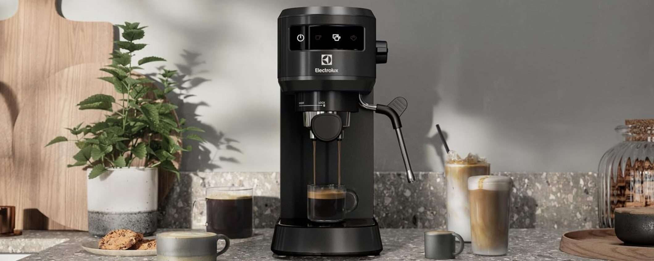 Macchina per caffè elegante e compatta per espresso in polvere e in cialde